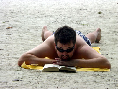 Mark, soaking up the sun, reading Crime and Punishment. Y'know, some light reading for a relaxing weekend.