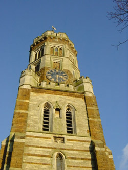 Church bell tower, and lots of beautiful blue sky.