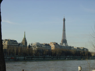We wandered along beside the River Seine, snapping photos of the famous Eiffel Tower in the winter morning sunshine.