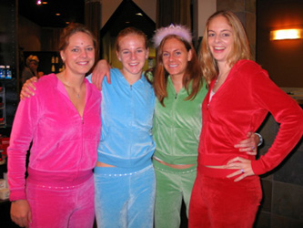 All the sisters, clad in  matching velour leisure suits. Classy.