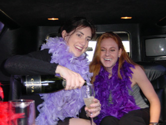 Champagne in a stretched white limo. Not a bad way to travel.