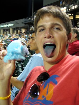 Cotton candy turns Kyle's tongue blue.