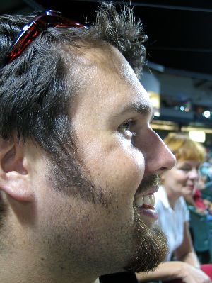 Mark in profile, my Mum in the background.