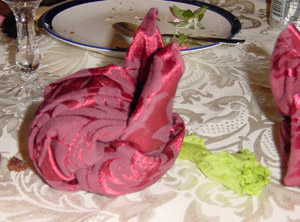 Napkin bunny nibbles on a lettuce leaf. For added realism, Neil added some outgoing deposits in the tail region.