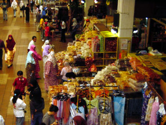 Customers inside Central Market, going about their business.